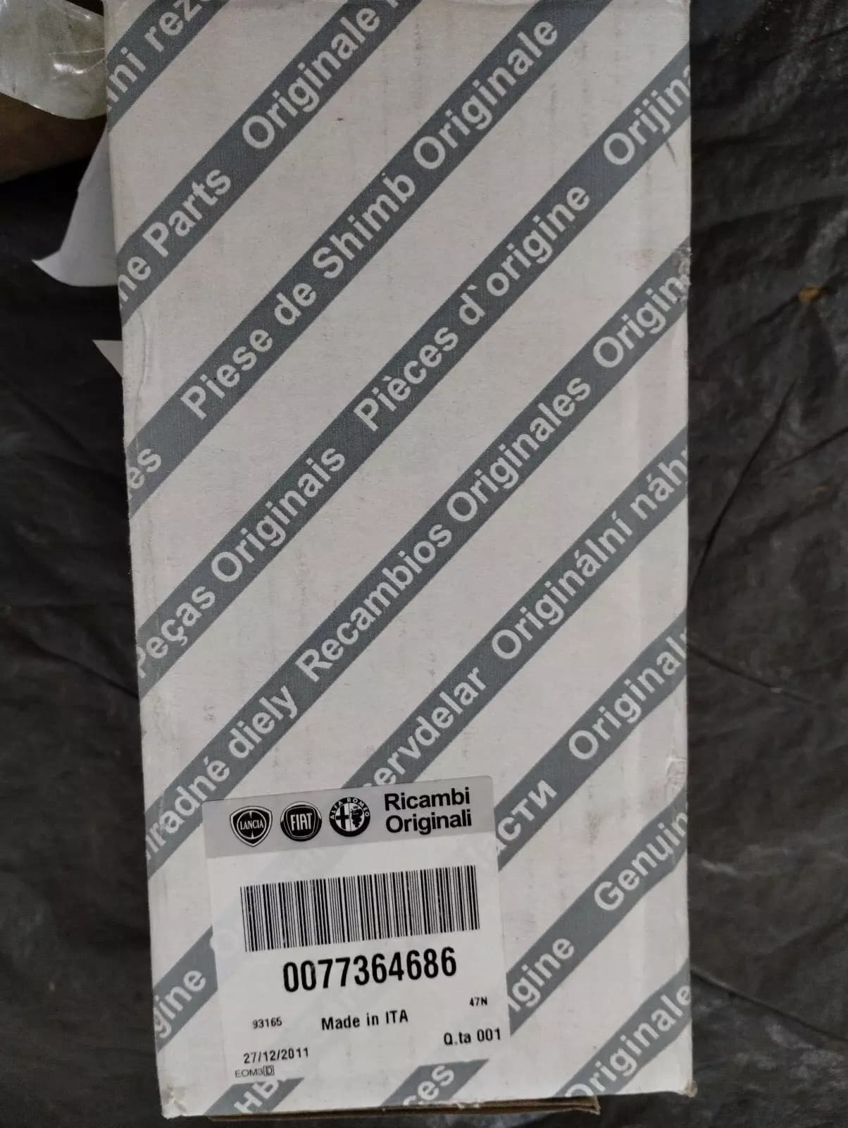 Genuine Fiat bracket for the brake caliper No: 77364686