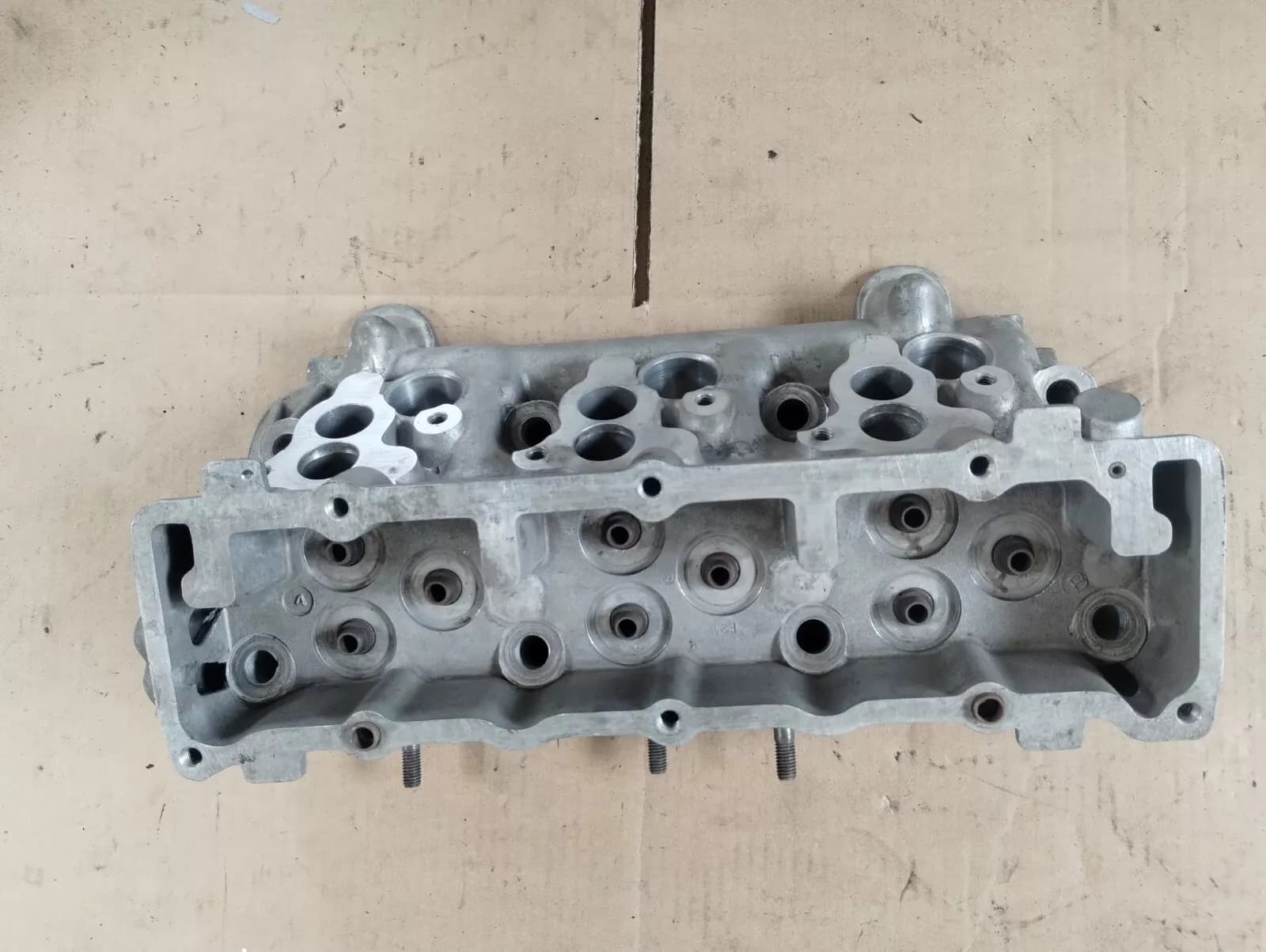 Maserati Biturbo V6 cylinder head,