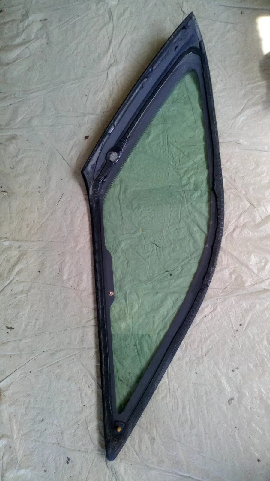 Saab 9-5 station wagon side window rear right, year 2002
