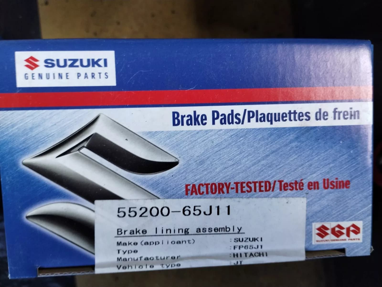Suzuki genuine brake pad set NR: 55200-65J11