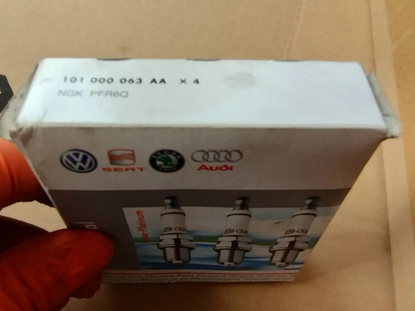 Genuine VW, AUDI Spark plug 4 pcs Nr: 101000063AA